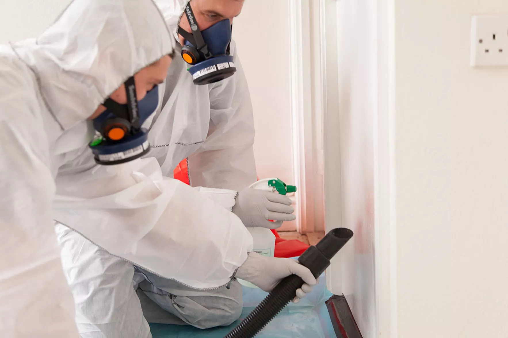 Asbestos surveyor in London inspecting a property safely